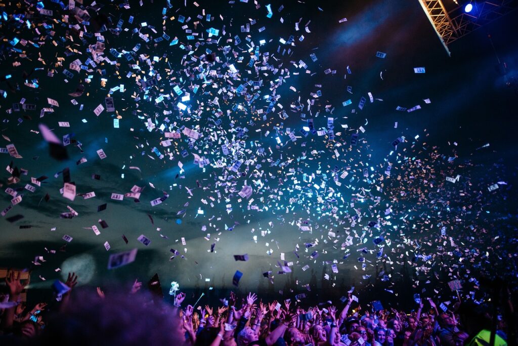 Confetti raining down on concert goers at an arena