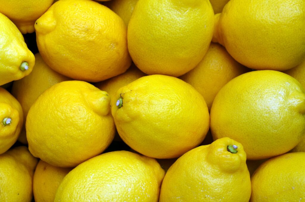 A bunch of lemons stacked on top of each other